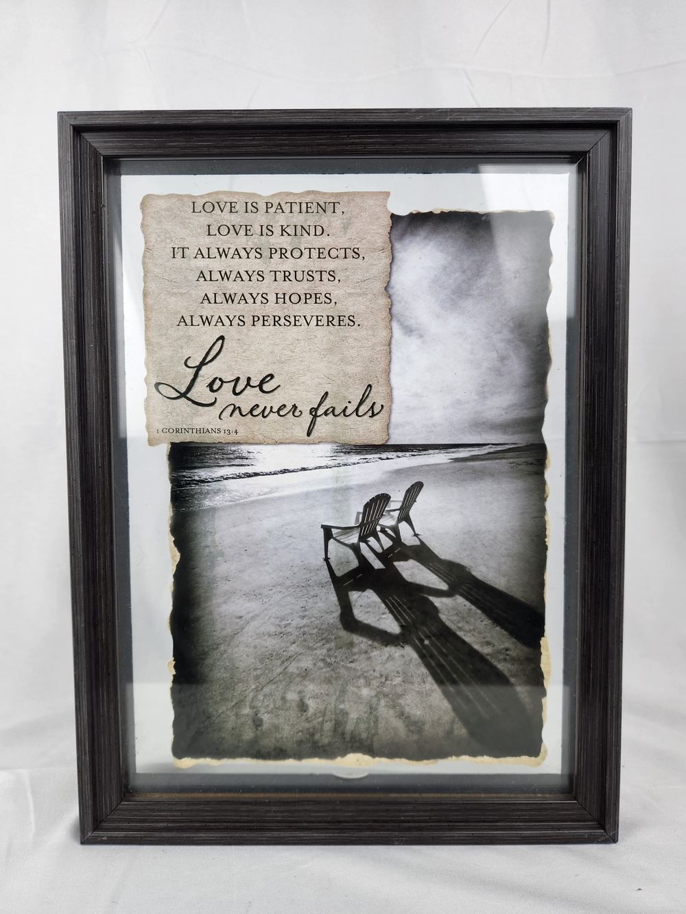 Love Never Fails Framed Wall Art - Black Frame